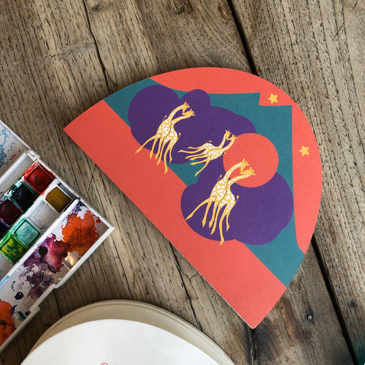 Orange and purple Artist sketchbooks with giraffe design. Ideal for sketching drawing painting, multimedia. Perfect for creative projects and neurodiverse profiles.