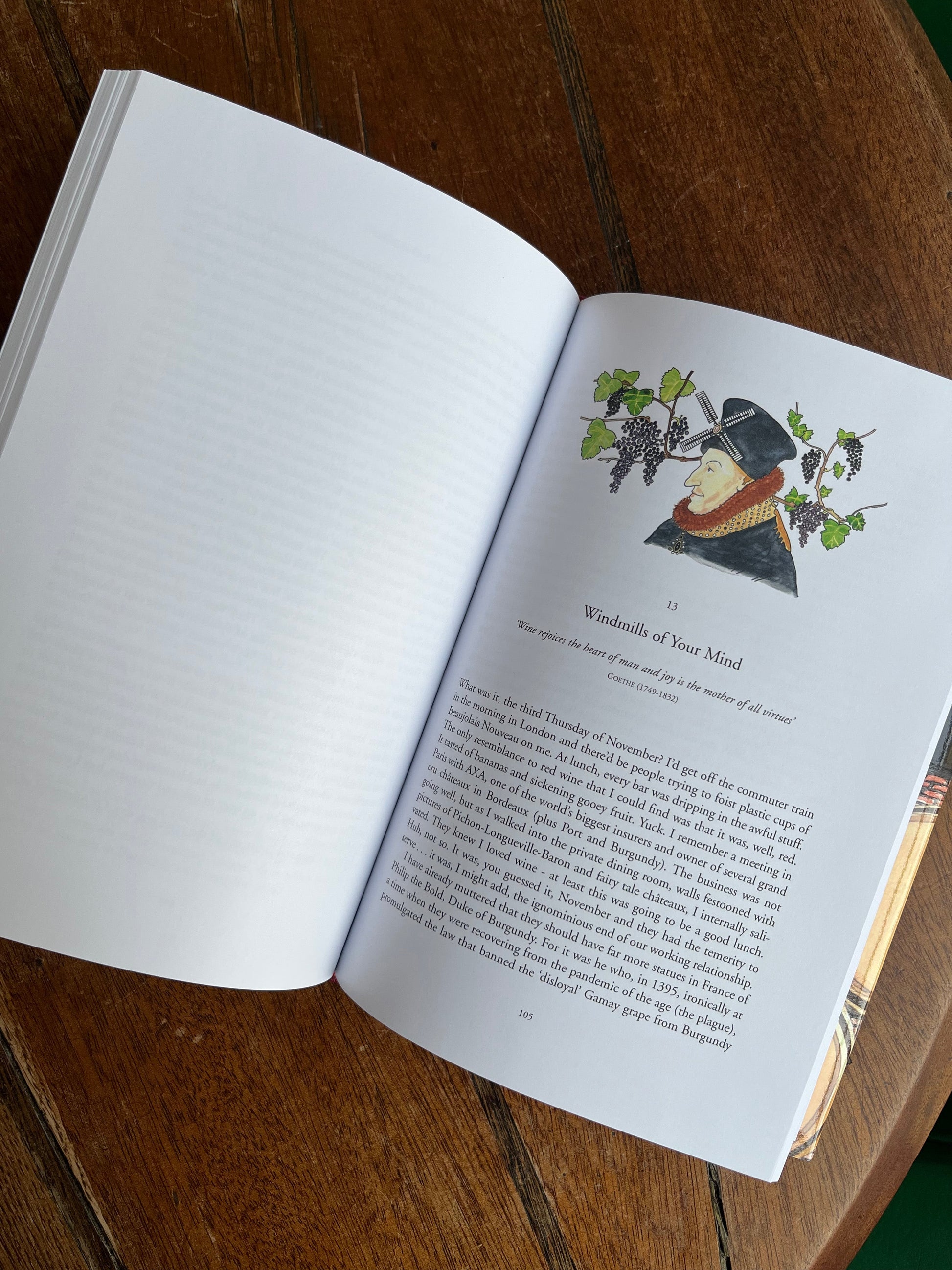Open book with a illustration on a wooden surface