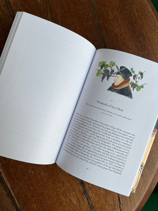 Open book with a illustration on a wooden surface